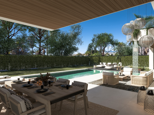 1. A contemporary villa featuring a swimming pool and a stylish lounge area, surrounded by lush greenery.